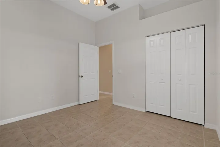 There is a large closet in this bedroom