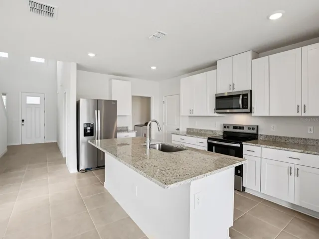 Interior photos are not of the actual home but are photos of the builder home with the same floorplan with similar interior finishes and features.