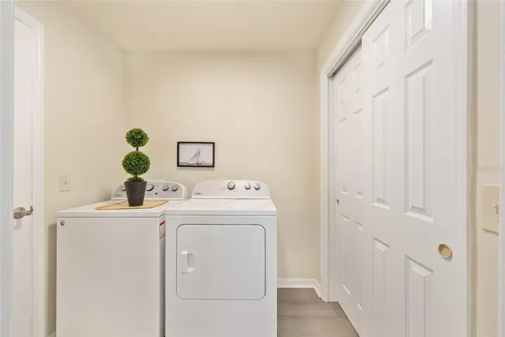 Laundry Room with Storage Closet