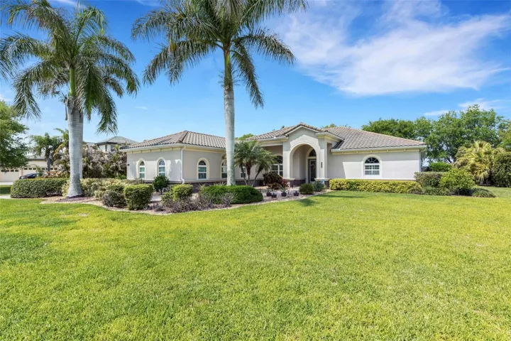 Royal Palms, Lemon Trees and Pineapple Plants grace the Landscaping