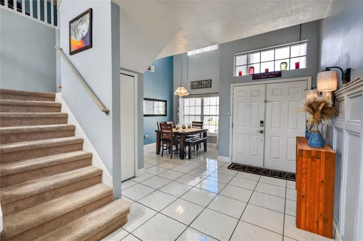 Coat Closet next to the Stairs