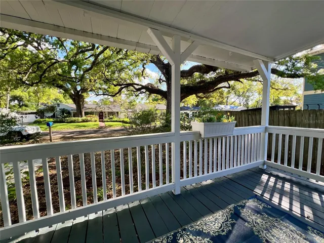 Greet your neighbors from your freshly painted front porch.