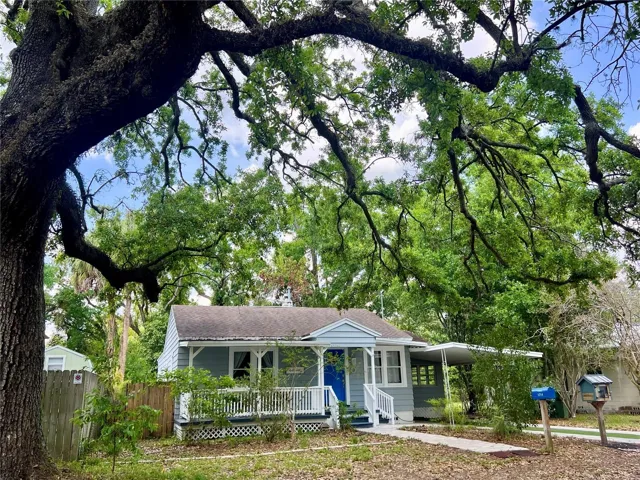 The cutest cottage under the trees! Come back soon before someone else scoops up your dream home!