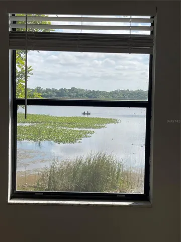 Window with view from primary bedroom