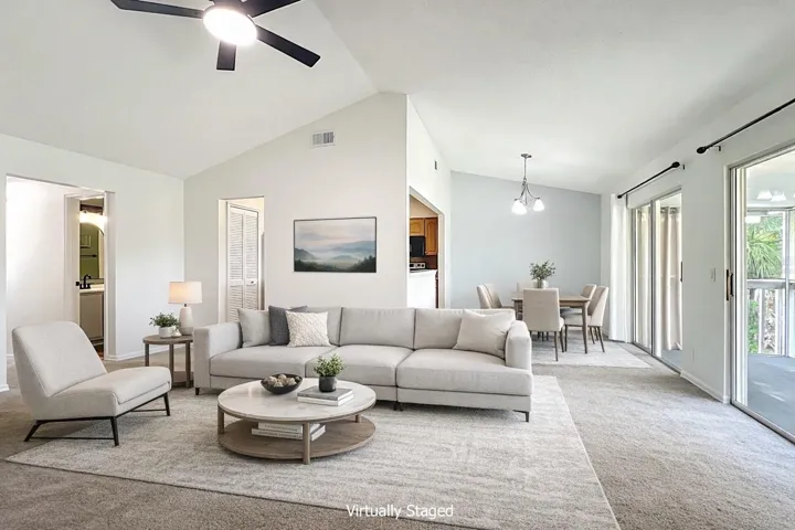 Virtually staged - OPEN AND INVITING LIVING ROOM.