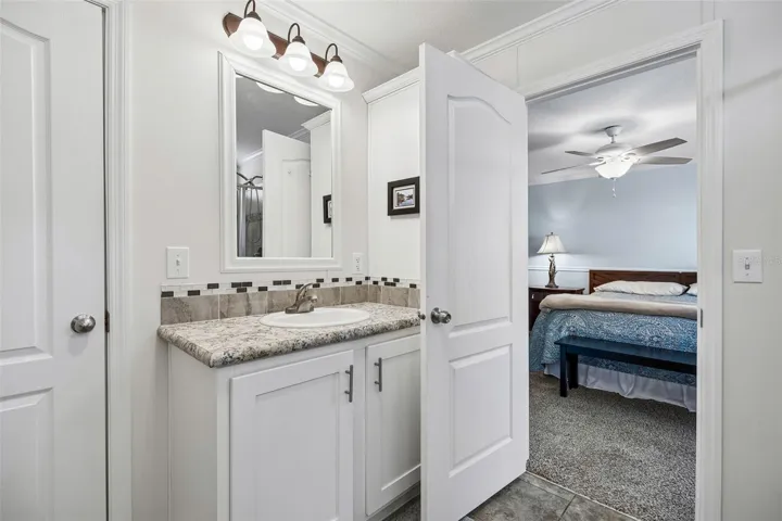 With adjacent full bath
