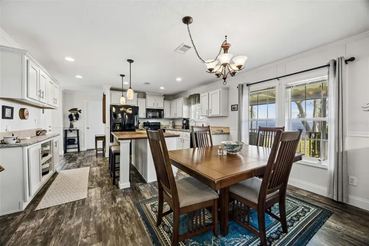Take special note of the unique, rustic-looking laminate flooring