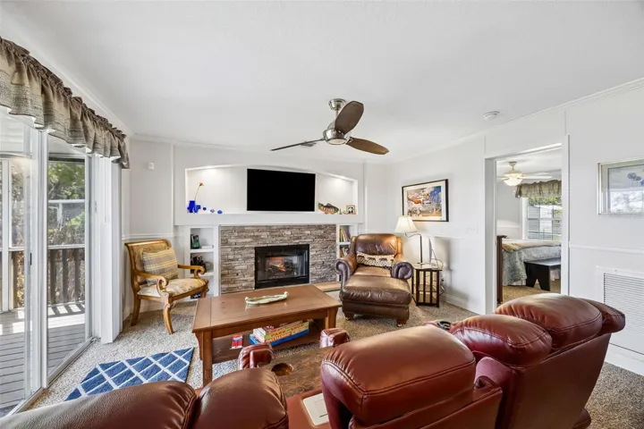 With gas log fireplace which has electric insert for ambiance