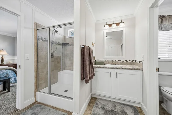And tiled, walk-in shower with seat