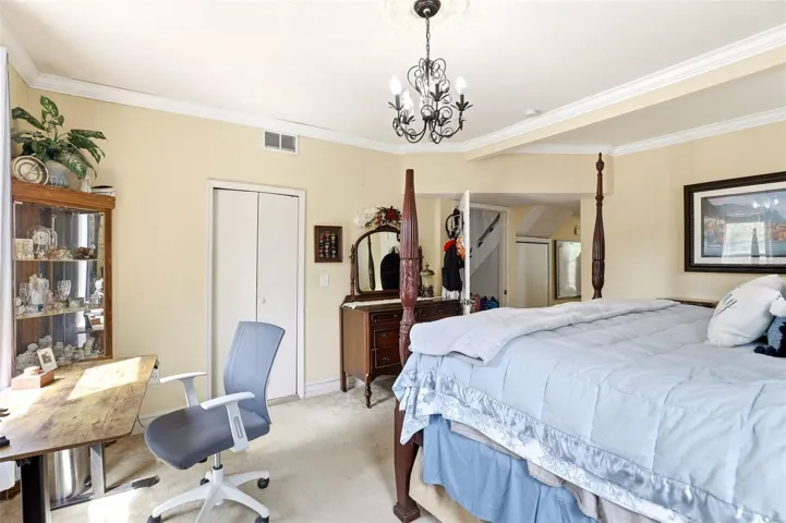 Second floor (mid-level) primary bedroom