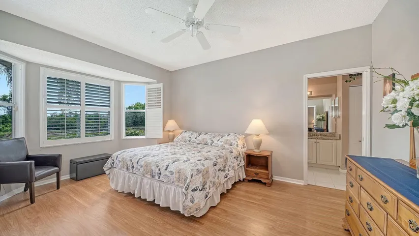 Primary bedroom has gorgeous views of the lake