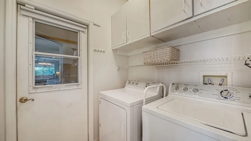 Laundry room conveniently located off the kitchen
