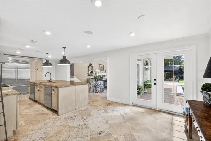 Dinette area with French doors to pool