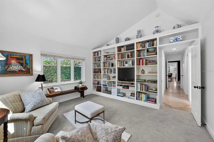 4th bedroom with custom built-in shelves