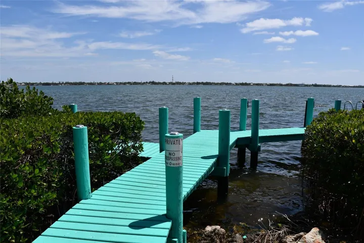 Shared dock on Lemon Bay to park boat, canoe, kayak or enjoy the sunrise!