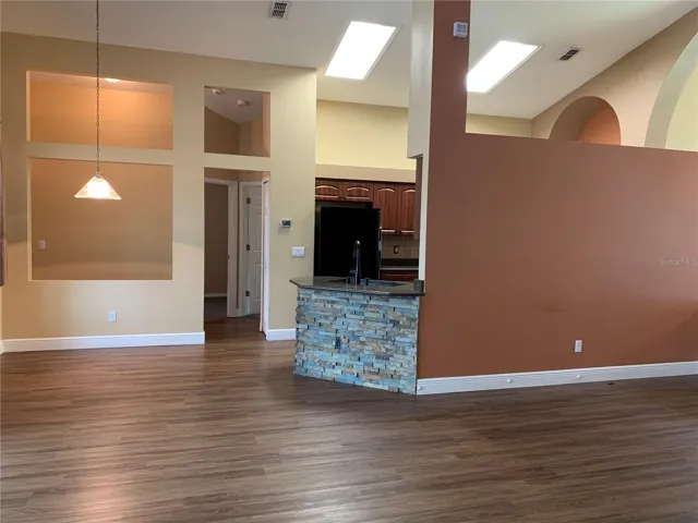 Living Room looking into eat in kitchen