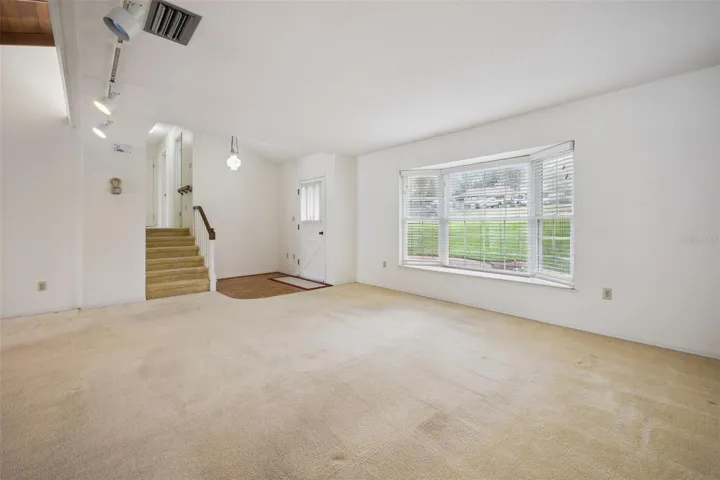 Formal Living Room w/ Upper Level Stairs