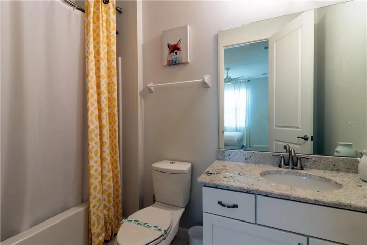 Bathroom 2-Room 2: Features a full tub/shower combo and conteporary design.