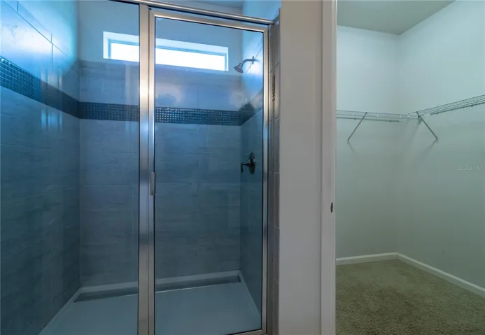 Bathroom 3- Master Suite: Private, en-suite bathroom with double vanity, large shower, and modern fixtures. Luxurius and spacious.