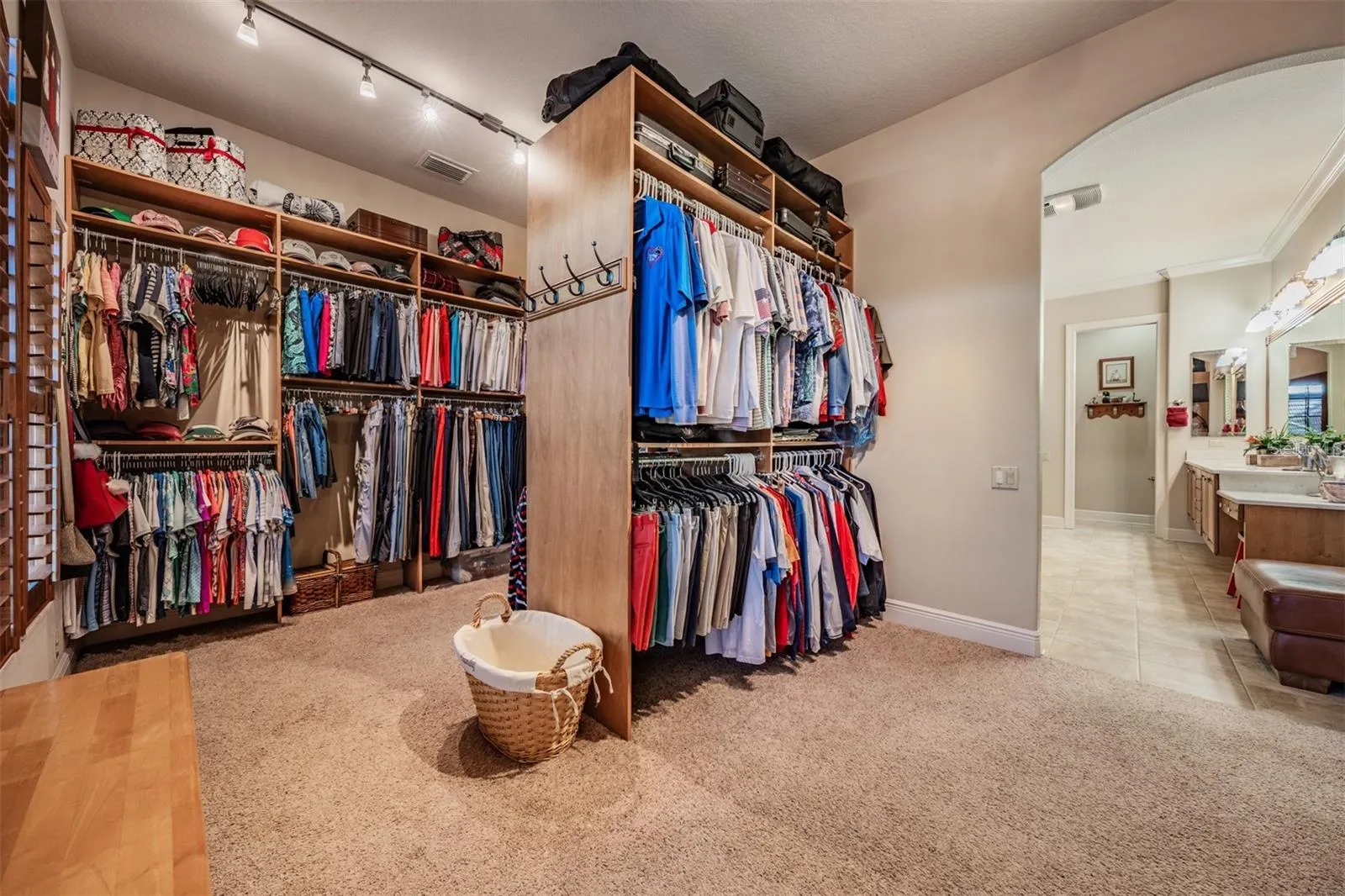 Custom closet could be another room!