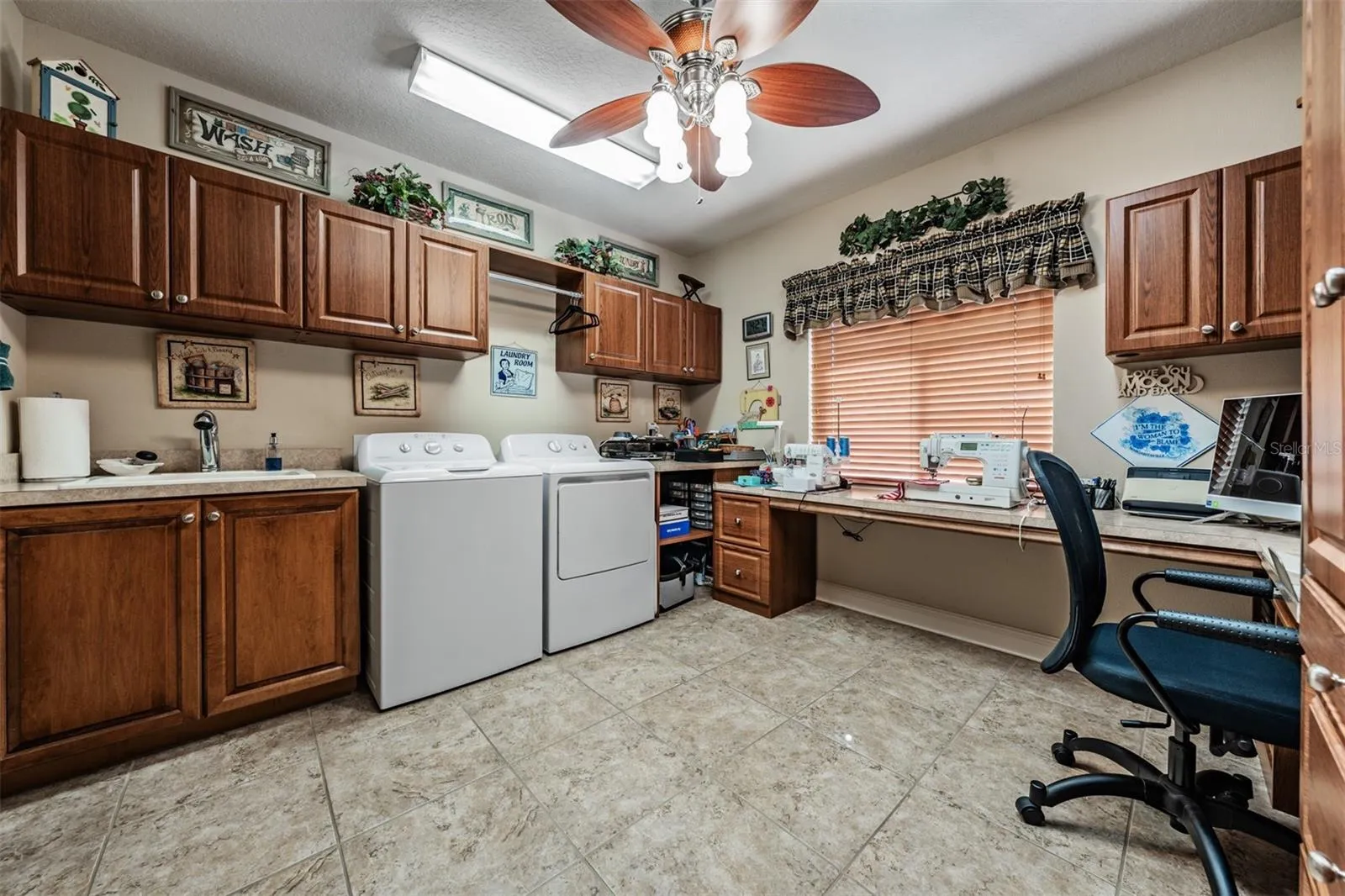 Shes gonna love this hobby/sewing/laundry/office room!