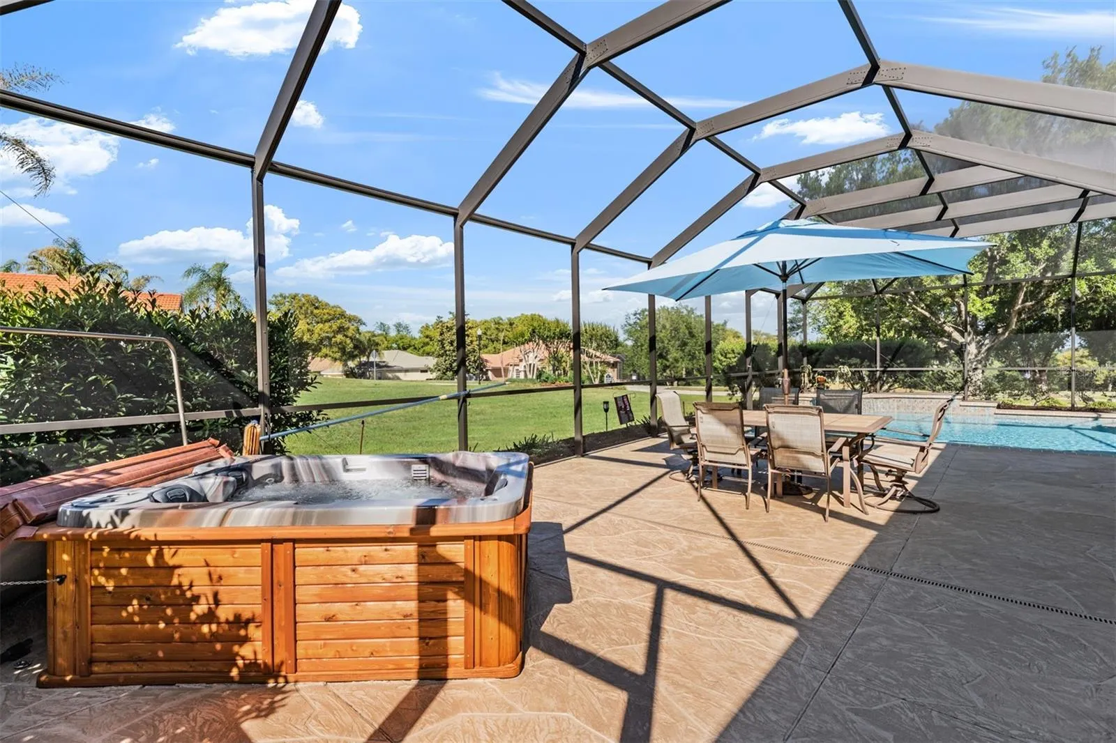 Relax and Rest Easy in your therapeutic hot tub with pool views!