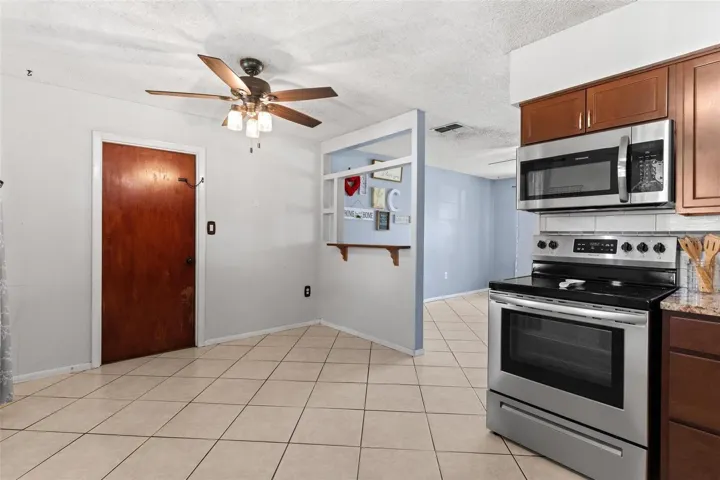 Dinette area overlooks kitchen.