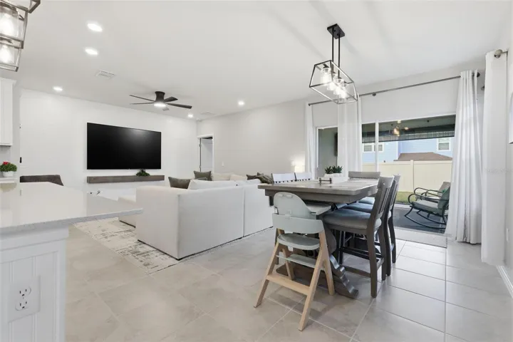 shared dining room, living room, and kitchen