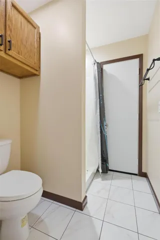 Water Closet with Shower and Pool Door