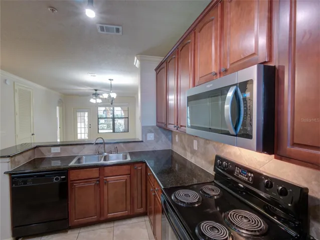 Kitchen with Granite Counter Tops/Upgraded Light Fixtures