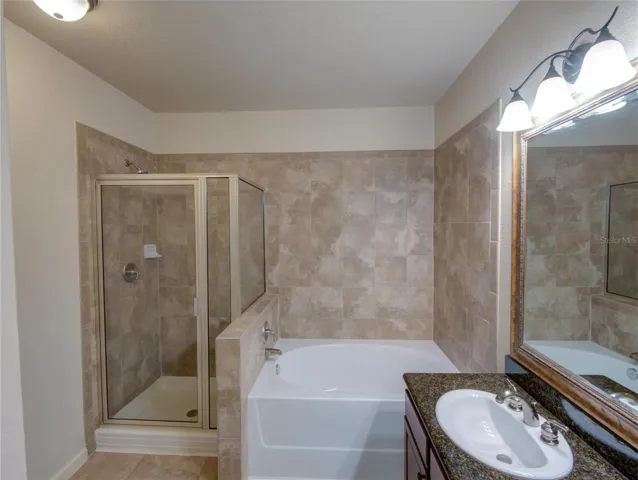 Primary Bathroom with Dual Sinks/Granite Counter Tops