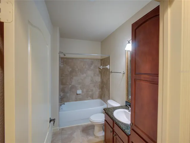 Primary Bathroom with Dual Sinks/Granite Counter Tops