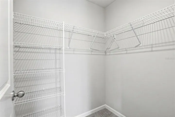 One Of Three Walk-in Closets