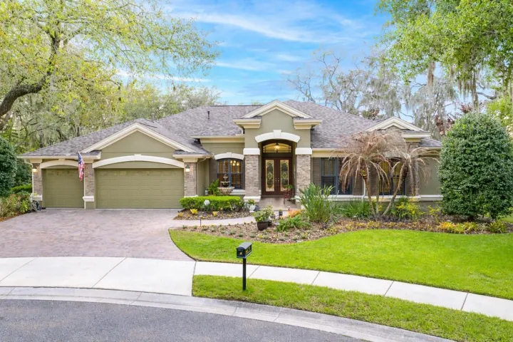 Stunning executive home located in the gated Tern Wood enclave of FishHawk Ranch.