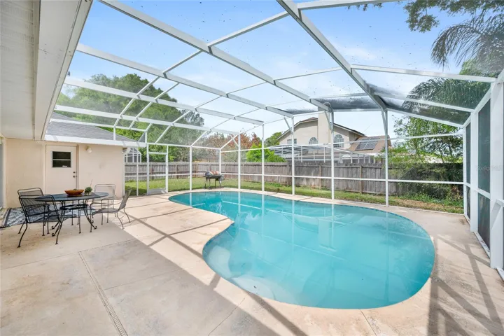 Enjoy entertaining around the screened pool