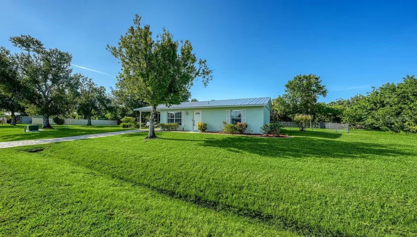 3/2 Home on Park-like setting with 2 lots.
