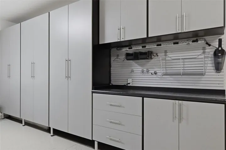 This isn’t just a garage… it’s a dream setup ??Custom cabinetry, built-in workspace, and sleek epoxy flooring make this space as functional as it is clean.