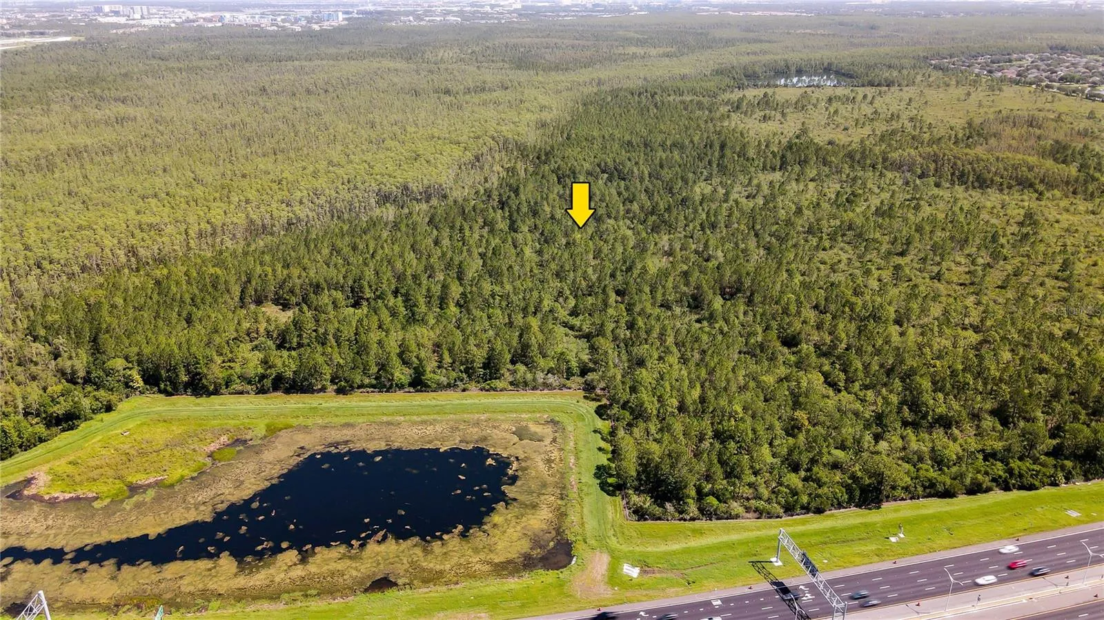 While no current infrastructure or public road access exists—with entry currently limited to trails from International Drive—the site sits north of the 417 and south of Central Florida Parkway near the established neighborhood of Hunters Creek.