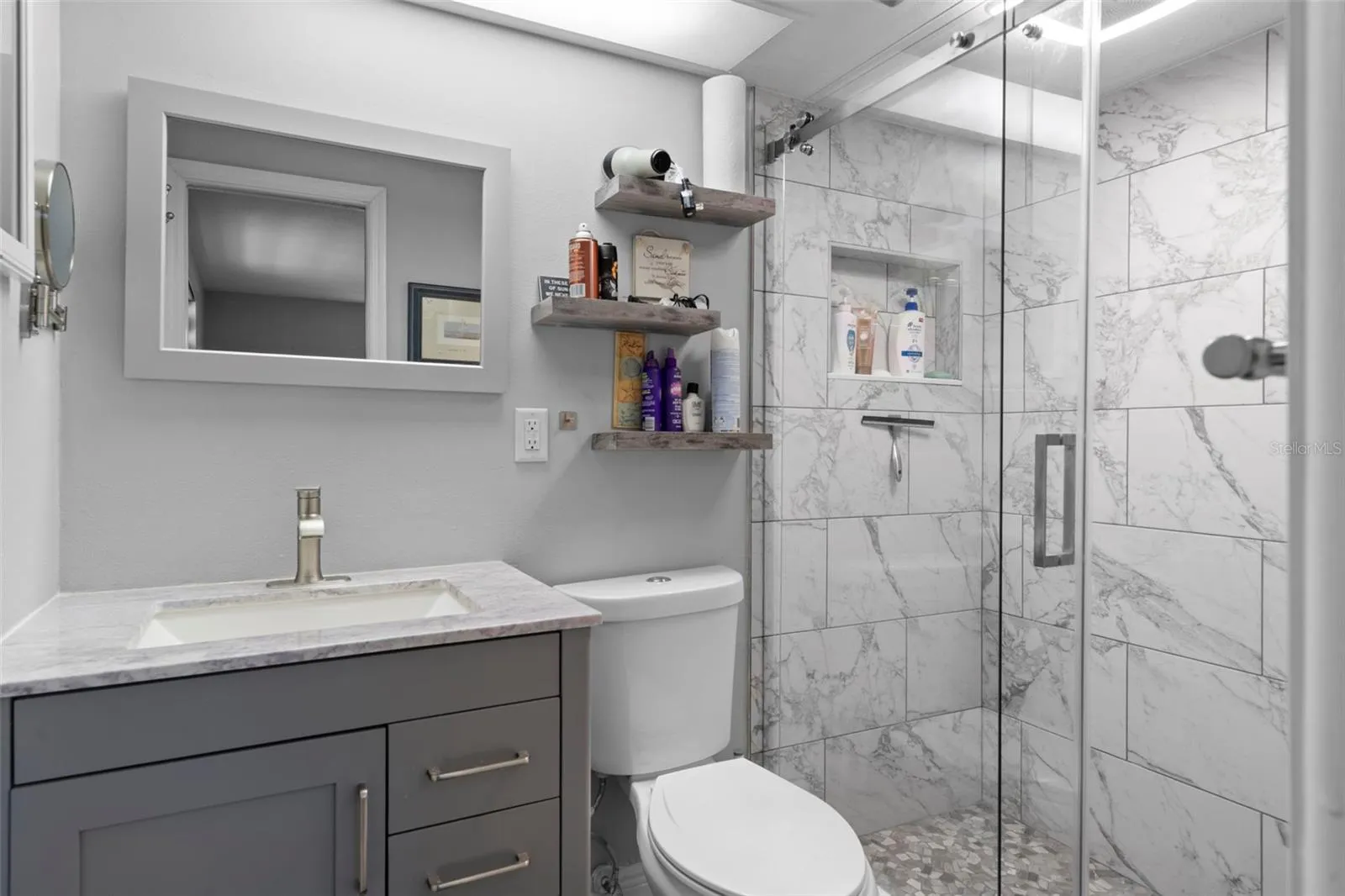 Primary Bath with NEW Vanity, NEW Toliet, NEW Tiled Shower