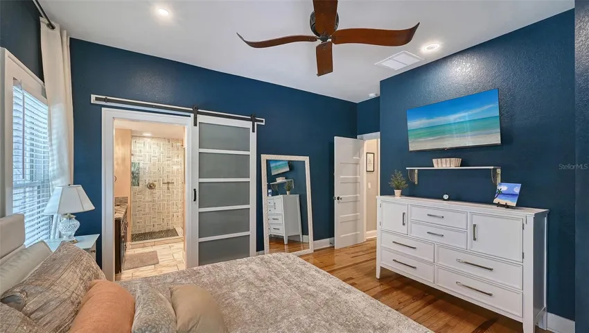 Primary Suite with Barn Door to En-Suite Bath