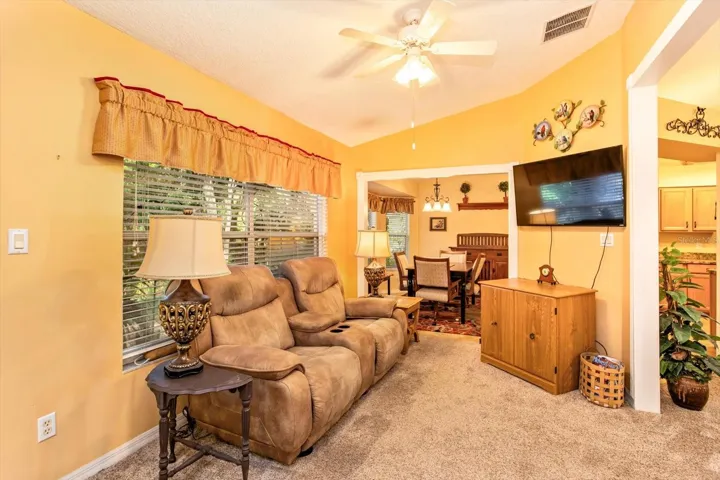 Family Room with cased openings to both the Breakfast Nook and the Great Room.