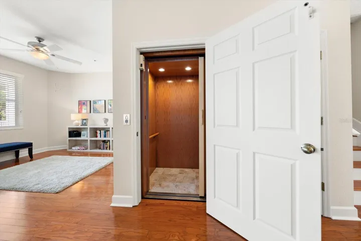 Attractive elevator services all levels of this townhome.