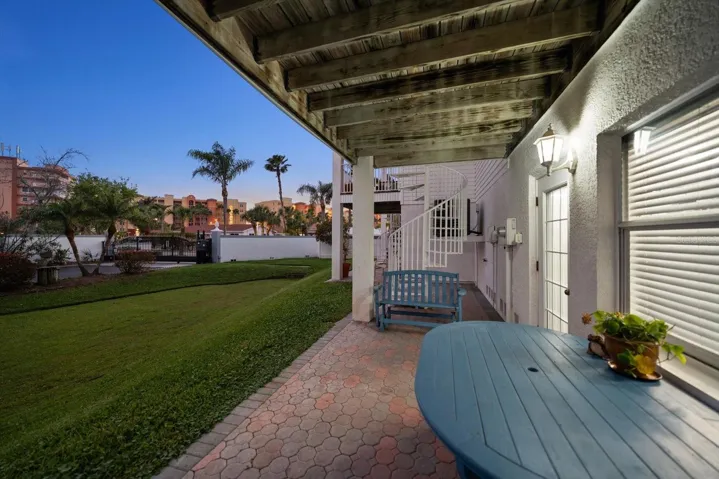 Enjoy the evenings from one of the several outdoor living areas of this home.