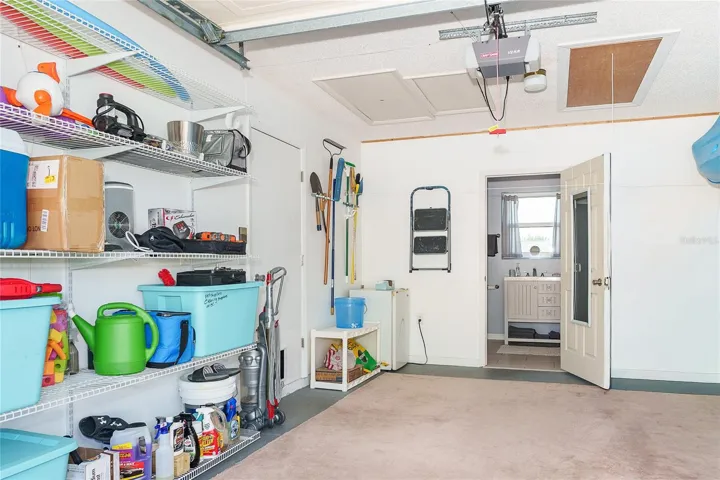 Neat & clean garage w/shelving