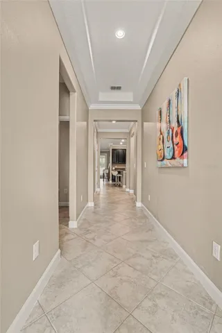 This 14 ft Grand Foyer gives this home a stately entrance and provides separation of the 2nd & 3rd Bedrooms from the rest of the home.