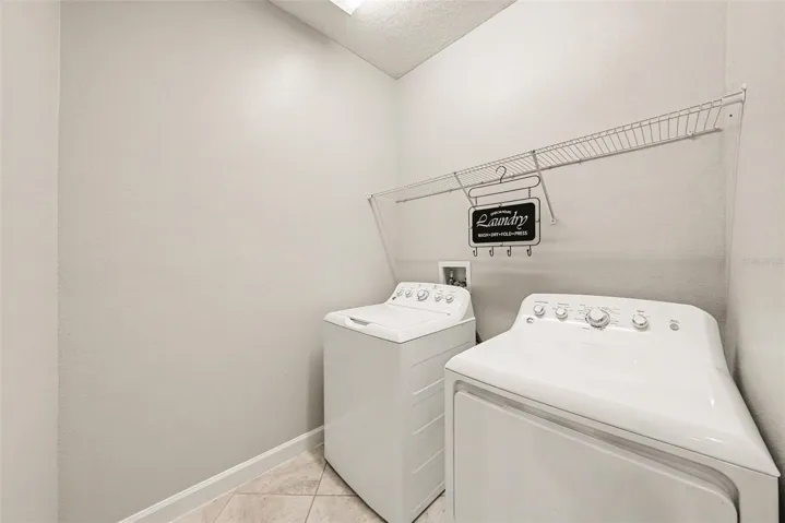 Indoor Laundry Room is perfectly located between the Primary Bath and the Kitchen.