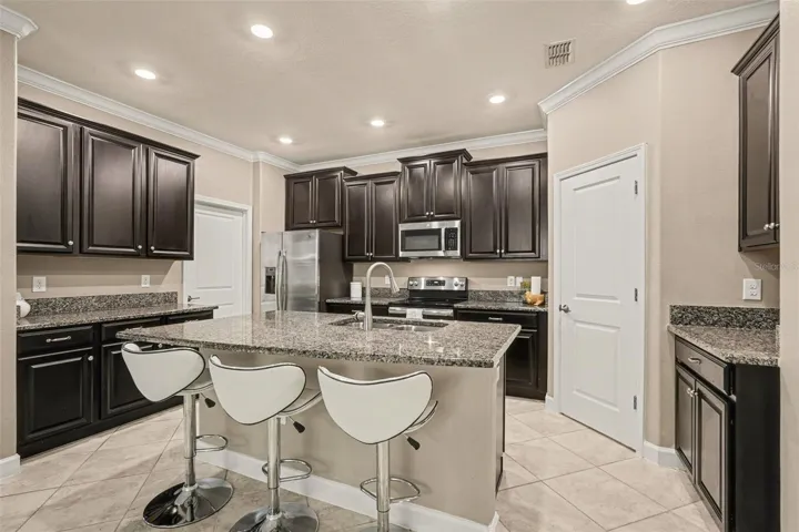 The upgraded cabinets have pull out shelves for easy access to storage