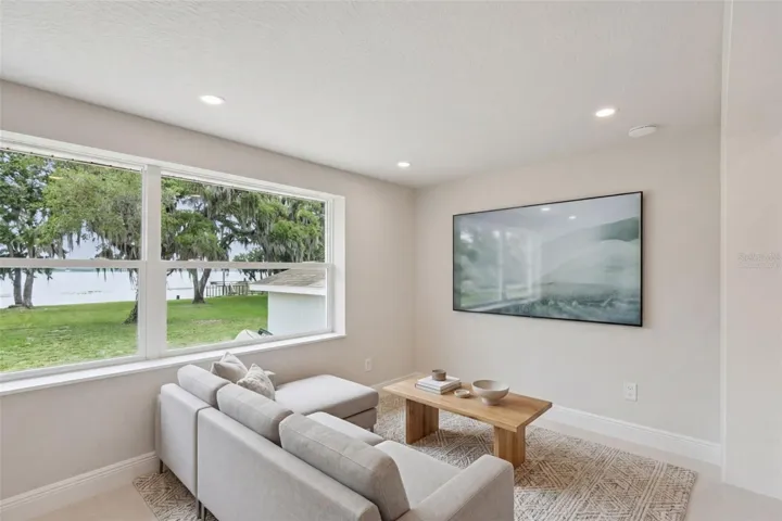 Virtually staged family room at lakeside