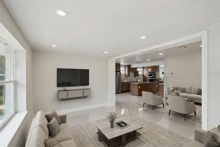 Virtually staged as a formal living and family room