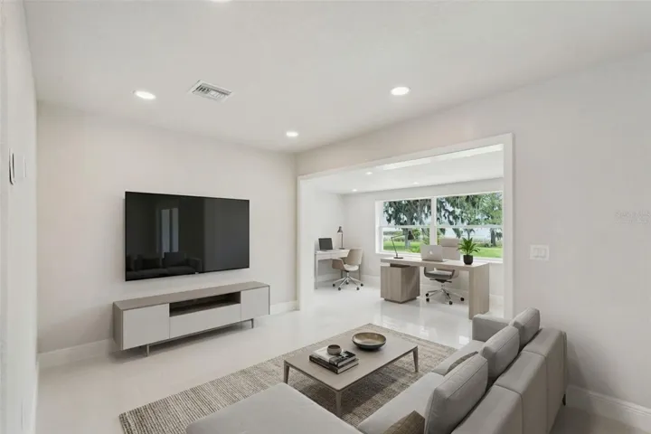 Virtually staged as a family room and lakeside office
